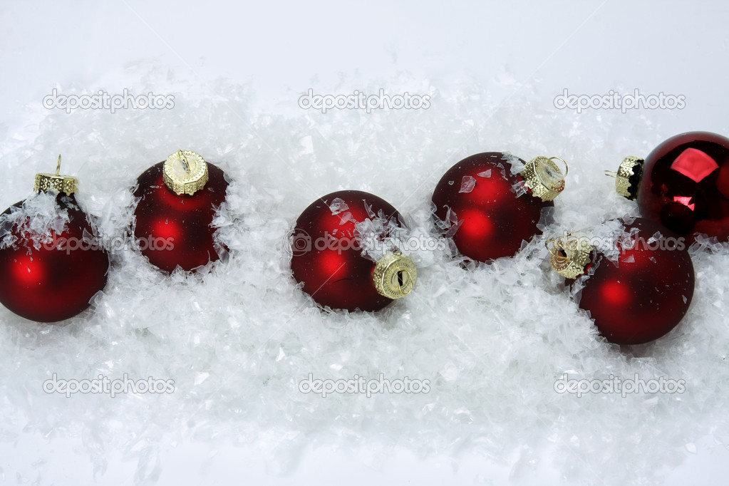 Christmas balls on snow.