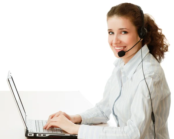 Vrouw met een laptop en headset — Stockfoto