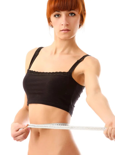 Woman measure her waist belly by metre-stick. — Stock Photo, Image