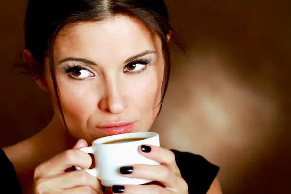 Woman with  coffee in hands — Stock Photo, Image