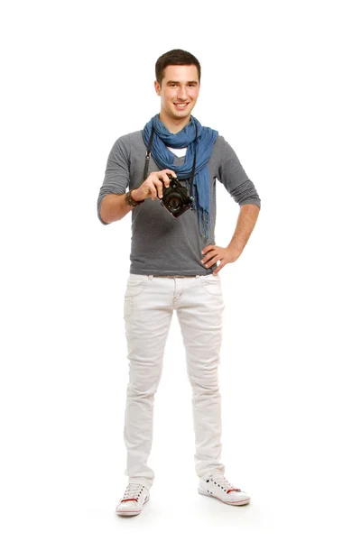 年轻的摄影师用相机 — 图库照片