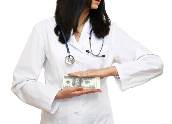 Dollars in the hands of a female doctor — Stock Photo, Image