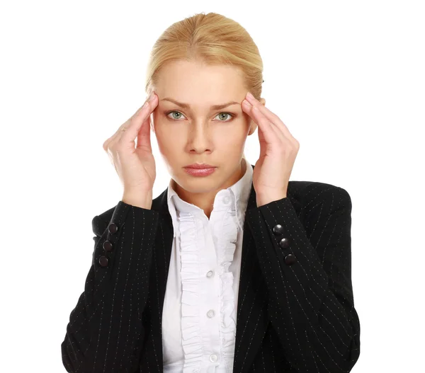 Businesswoman with a headache holding head — Stock Photo, Image