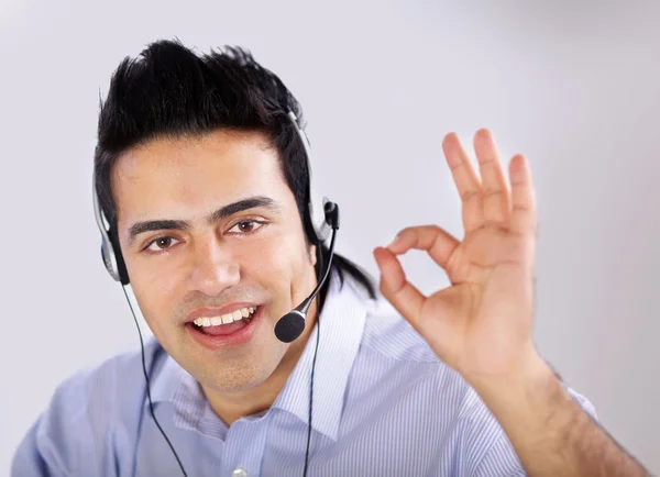 Customer service agent showing ok — Stock Photo, Image