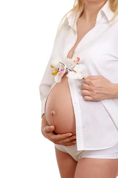 妊娠中の女性タッチ彼女の腹とともに手 — ストック写真