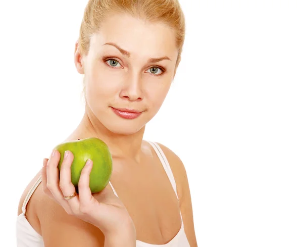 Vrouw met een groene appel op haar hand — Stockfoto