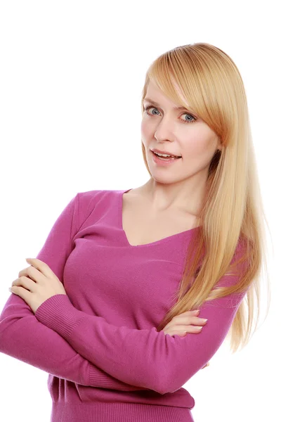 Mujer vestida con una blusa rosa de pie — Foto de Stock