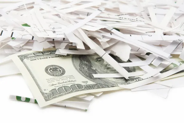 Heap of paper strips and dollars — Stock Photo, Image