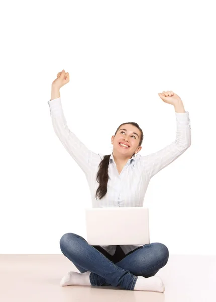 Girl sitting on the floor, hands up — Stock Photo, Image