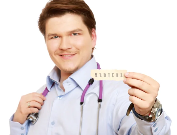 Médico varón mostrando la palabra — Foto de Stock