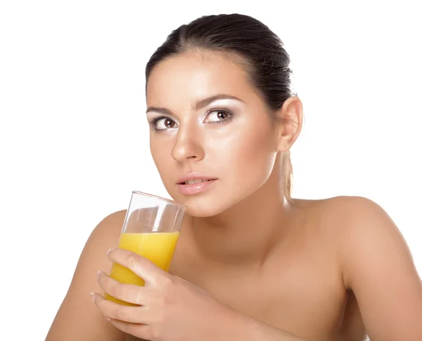 Young woman drinking orange juice — Stock Photo, Image