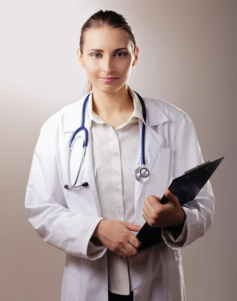 Female doctor with a folder — Stock Photo, Image