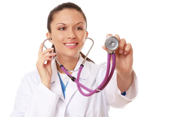 Young female doctor listening — Stock Photo, Image