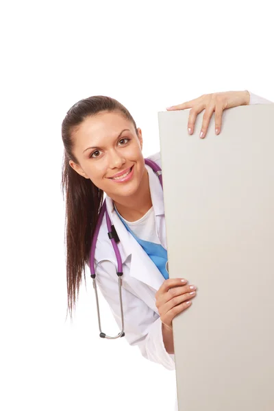 Female doctor and empty blank — Stock Photo, Image