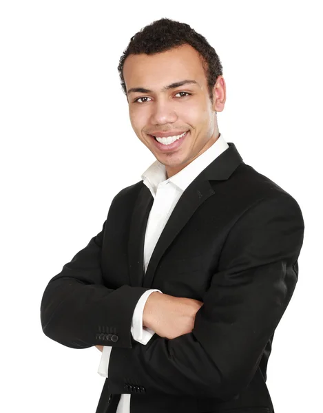 Knappe jonge zakenman permanent met gevouwen armen op witte achtergrond — Stockfoto