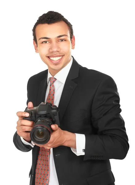 Een lachende professionele fotograaf — Stockfoto