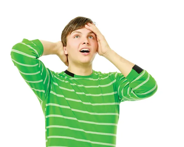 Jonge man in paniek hoofd houden — Stockfoto