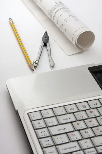 Draft and a white laptop — Stock Photo, Image