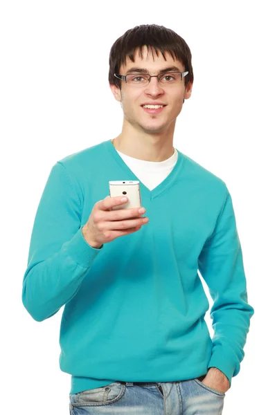 Ung kille med en mobiltelefon — Stockfoto