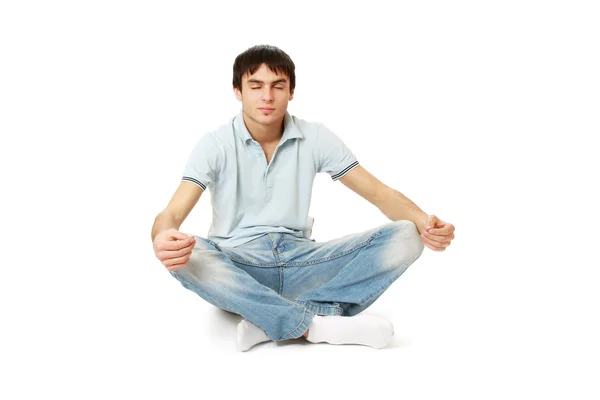 Young handsome guy meditating — Stock Photo, Image