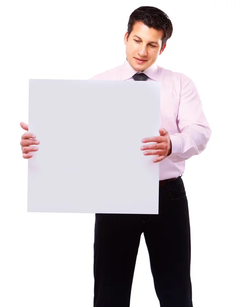 Businessman holding a blank — Stock Photo, Image