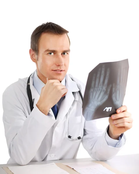 Male doctor examining x-ray — Stock Photo, Image