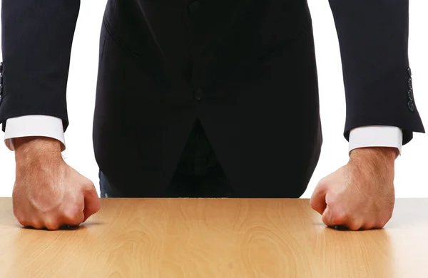 Unknown man standing near desk — Stock Photo, Image
