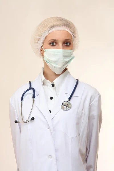 Female doctor wearing a bandage — Stock Photo, Image