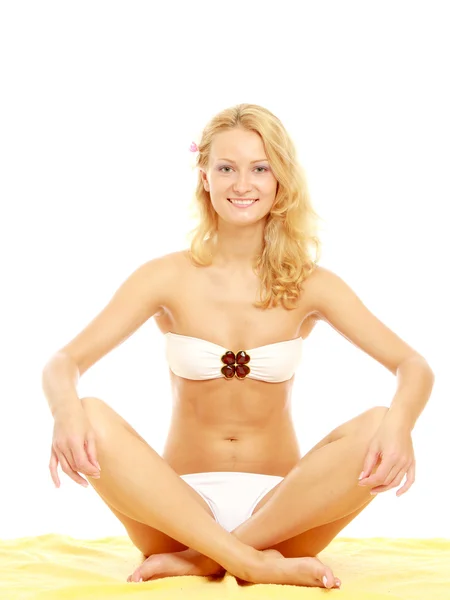 Woman in a swimsuit meditating — Stock Photo, Image