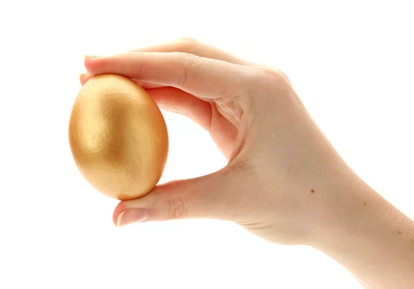 Uovo d'oro in mano — Foto Stock