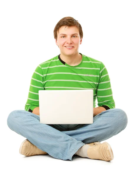 A young man sitting  with laptop — Stock Photo, Image