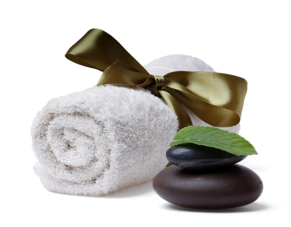 Stone, towel and leaf of mint — Stock Photo, Image