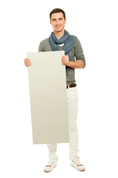 Un hombre guapo sosteniendo un blanco —  Fotos de Stock