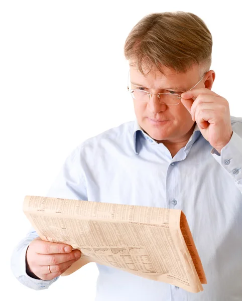 Un hombre de negocios leyendo un periódico —  Fotos de Stock