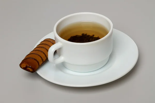 Uma xícara de chá com biscoitos — Fotografia de Stock