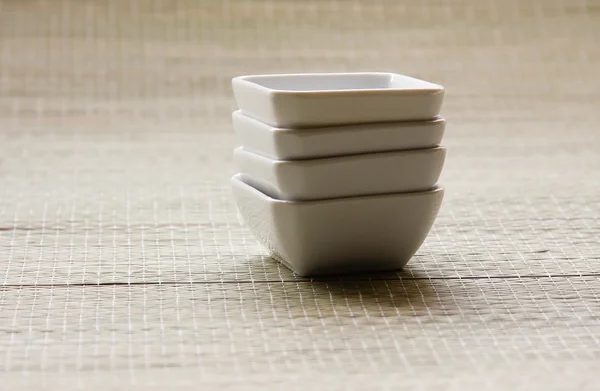 White bowls on the desk. — Stock Photo, Image