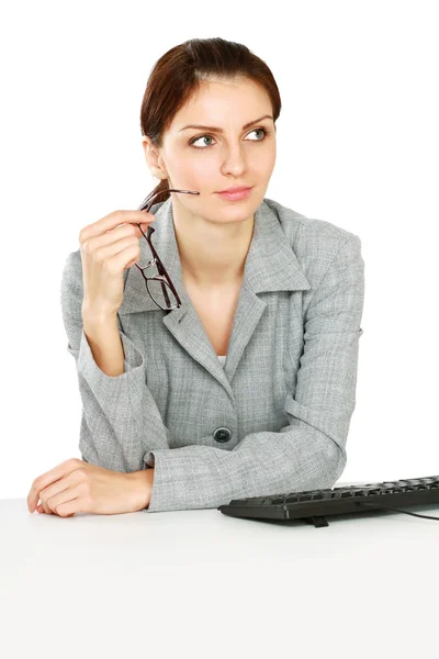 Businesswoman sitting on the desk — Stock Photo, Image