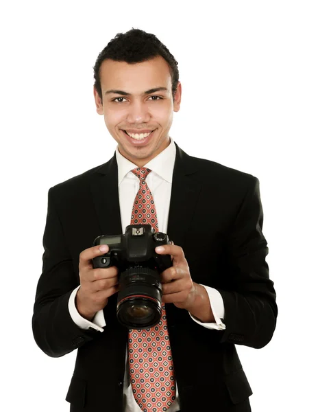 Ein lächelnder professioneller Fotograf — Stockfoto