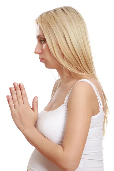 Una mujer embarazada meditando — Foto de Stock