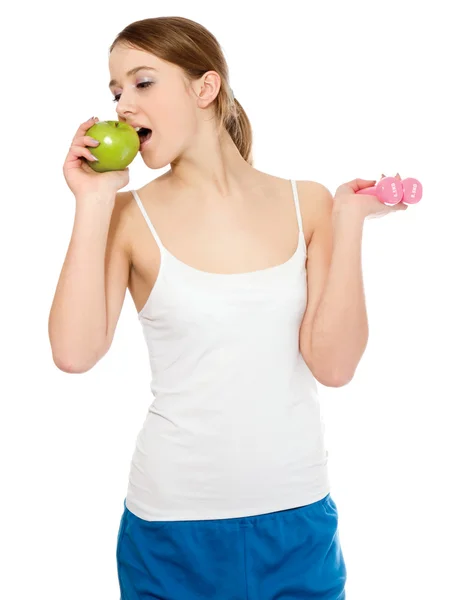 Woman eating green apple — Stock Photo, Image