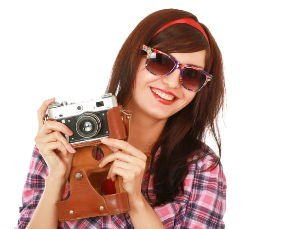 Beautiful young woman with camera — Stock Photo, Image