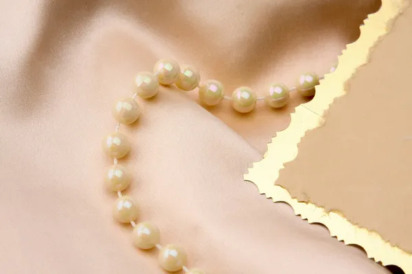 Invitation card and pearl — Stock Photo, Image