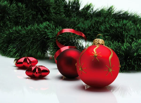 Decoration balls and fir branch — Stock Photo, Image