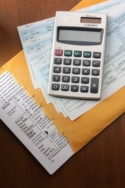 Калькулятор на бізнес-папері . — стокове фото