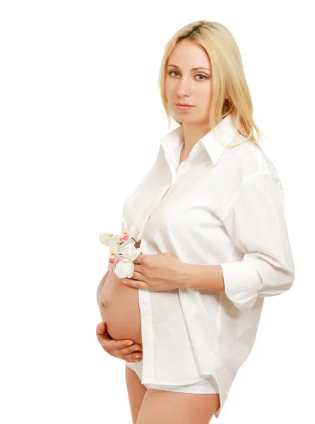 Pregnant woman with orchid — Stock Photo, Image