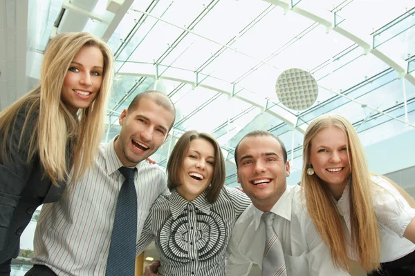 Businessman standing with his staff — Stock Photo, Image
