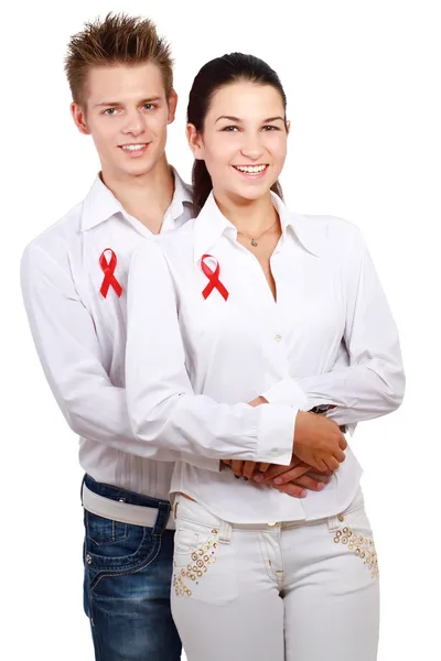 Couple using red for AIDS — Stock Photo, Image