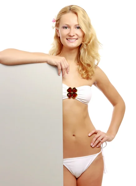 Woman in a swimsuit with a blank — Stock Photo, Image