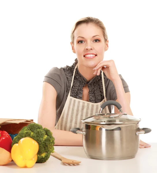 Woman in apron and food — Stock Photo, Image