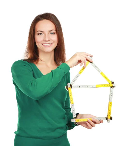 Woman holding a ruler — Stock Photo, Image